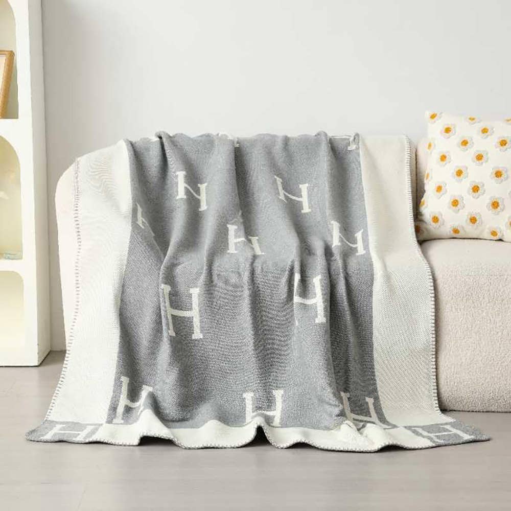 Monogram Pattern Reversible Throw Blanket in Gray